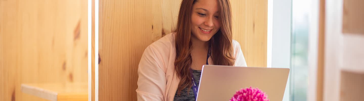 TELUS International employee working