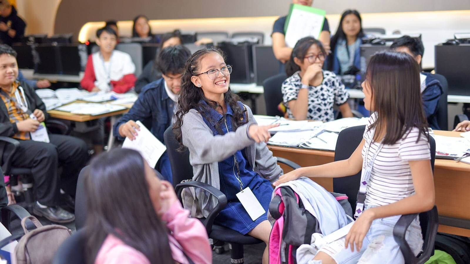 A group of children in a room learning