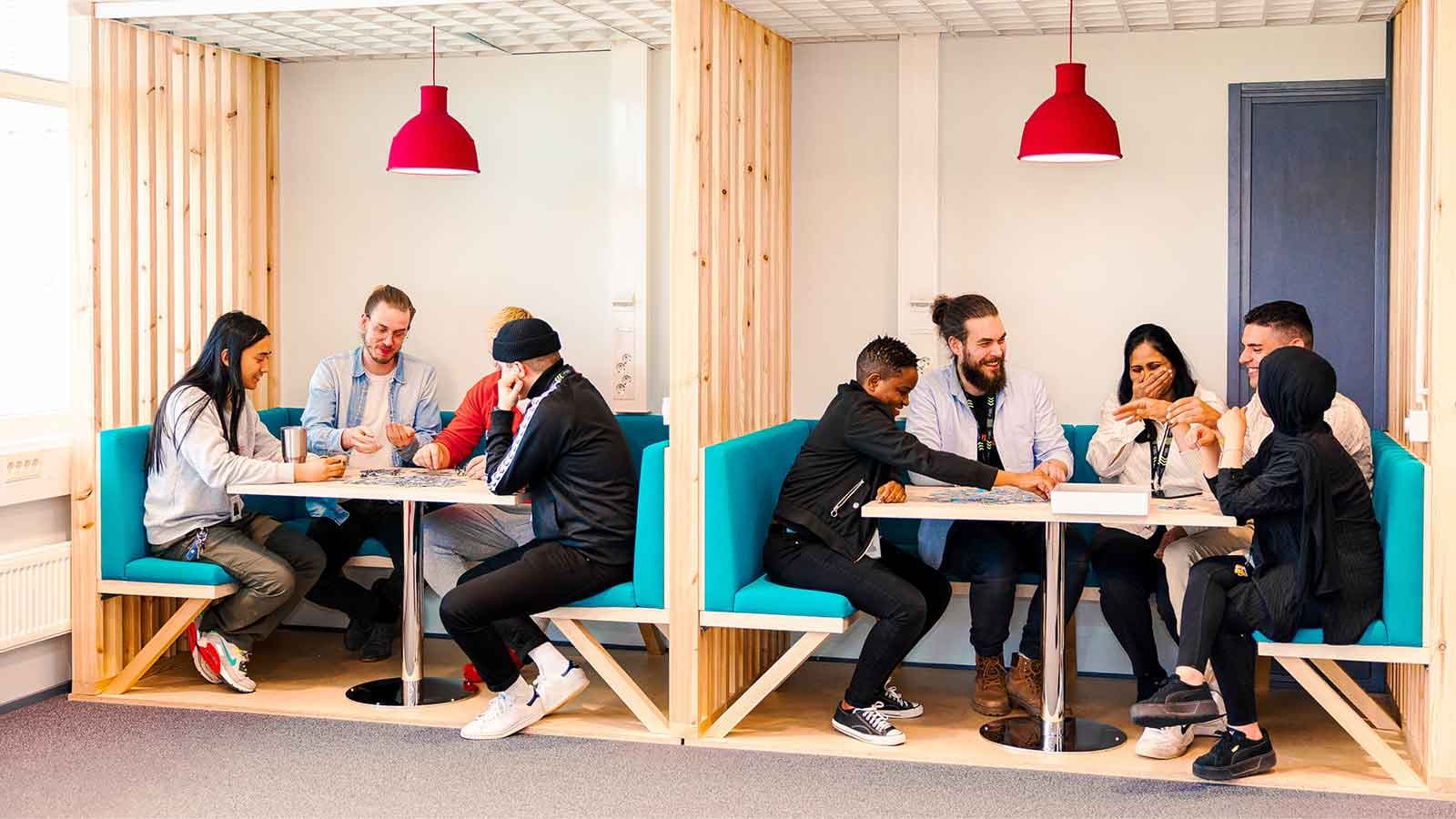 Employees socializing at Tampere office location.